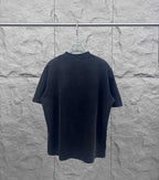 Balenciaga short-sleeve T-shirt in dark color, back view with crew neckline
