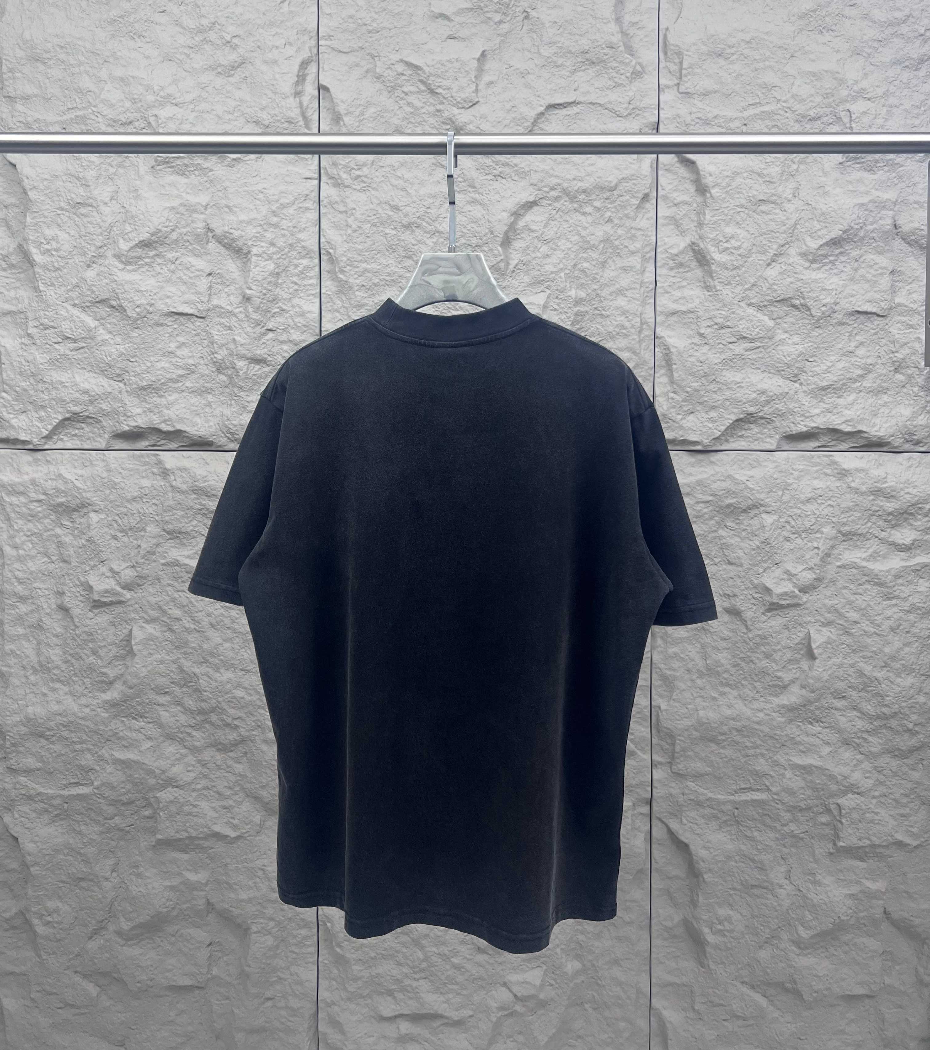 Balenciaga short-sleeve T-shirt in dark color, back view with crew neckline