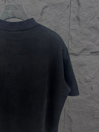 Balenciaga short-sleeve T-shirt in dark color, left side view with crew neckline