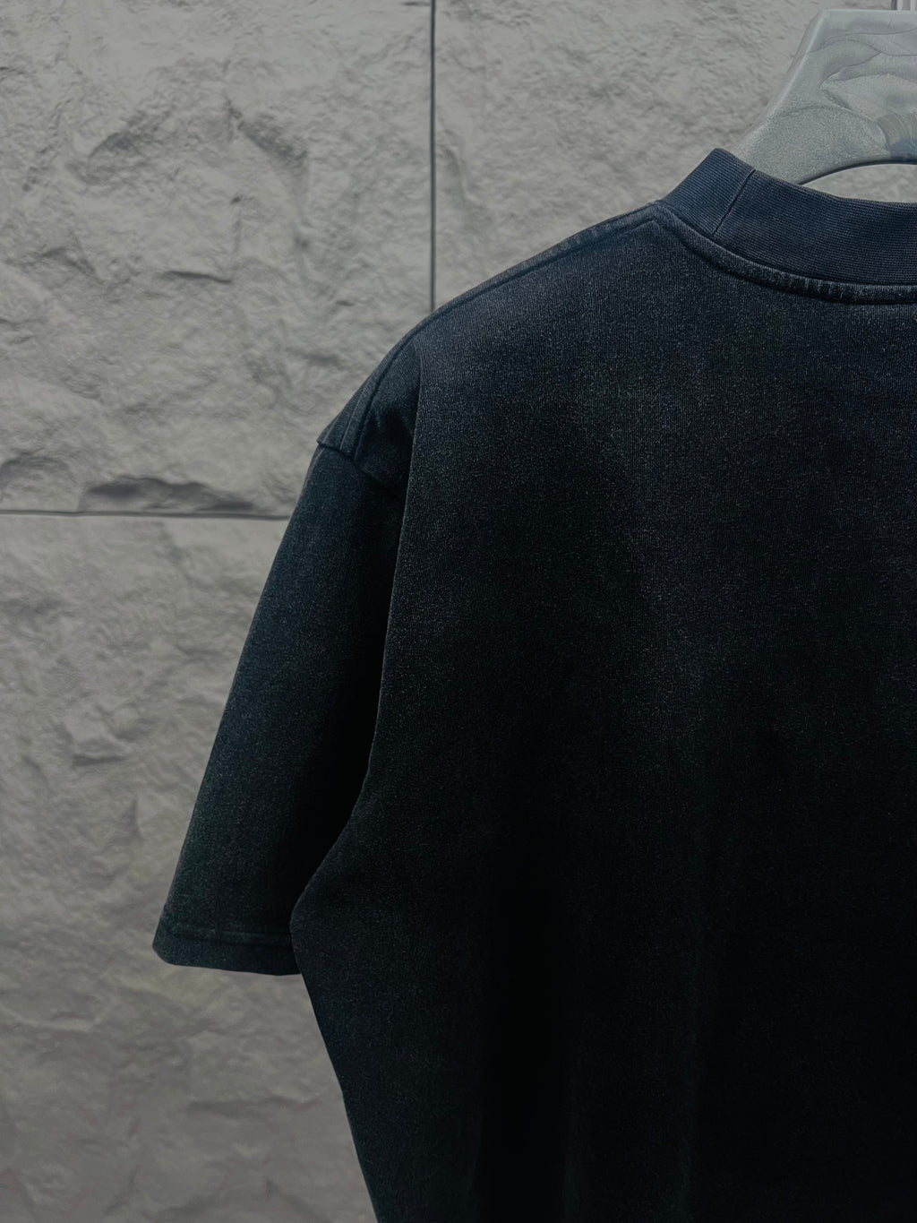 Balenciaga short-sleeve T-shirt in dark color, back/shoulder view