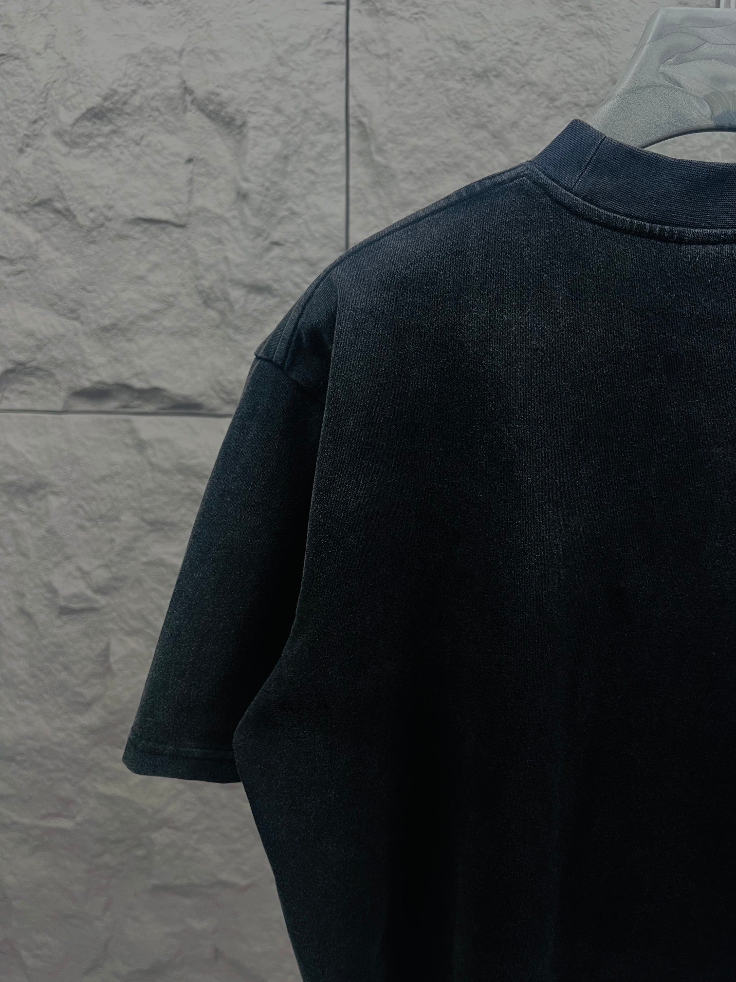 Balenciaga short-sleeve T-shirt in dark color, back/shoulder view