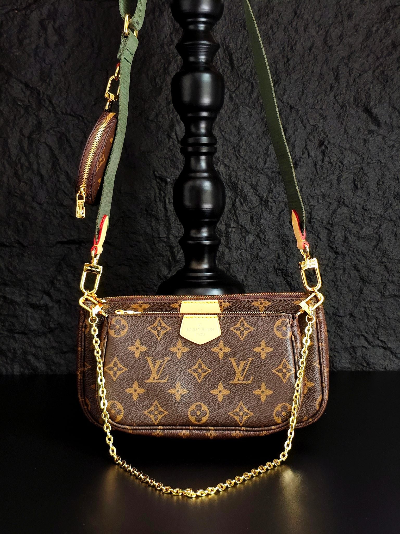 Louis Vuitton monogram crossbody bag with gold chain, brown flap and green strap