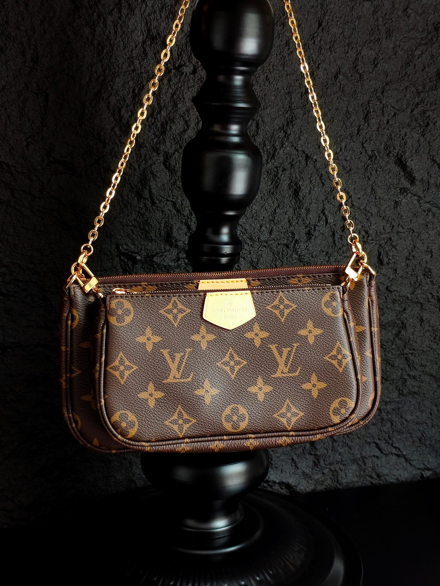 Louis Vuitton crossbody bag with monogram canvas, gold chain handles, front view