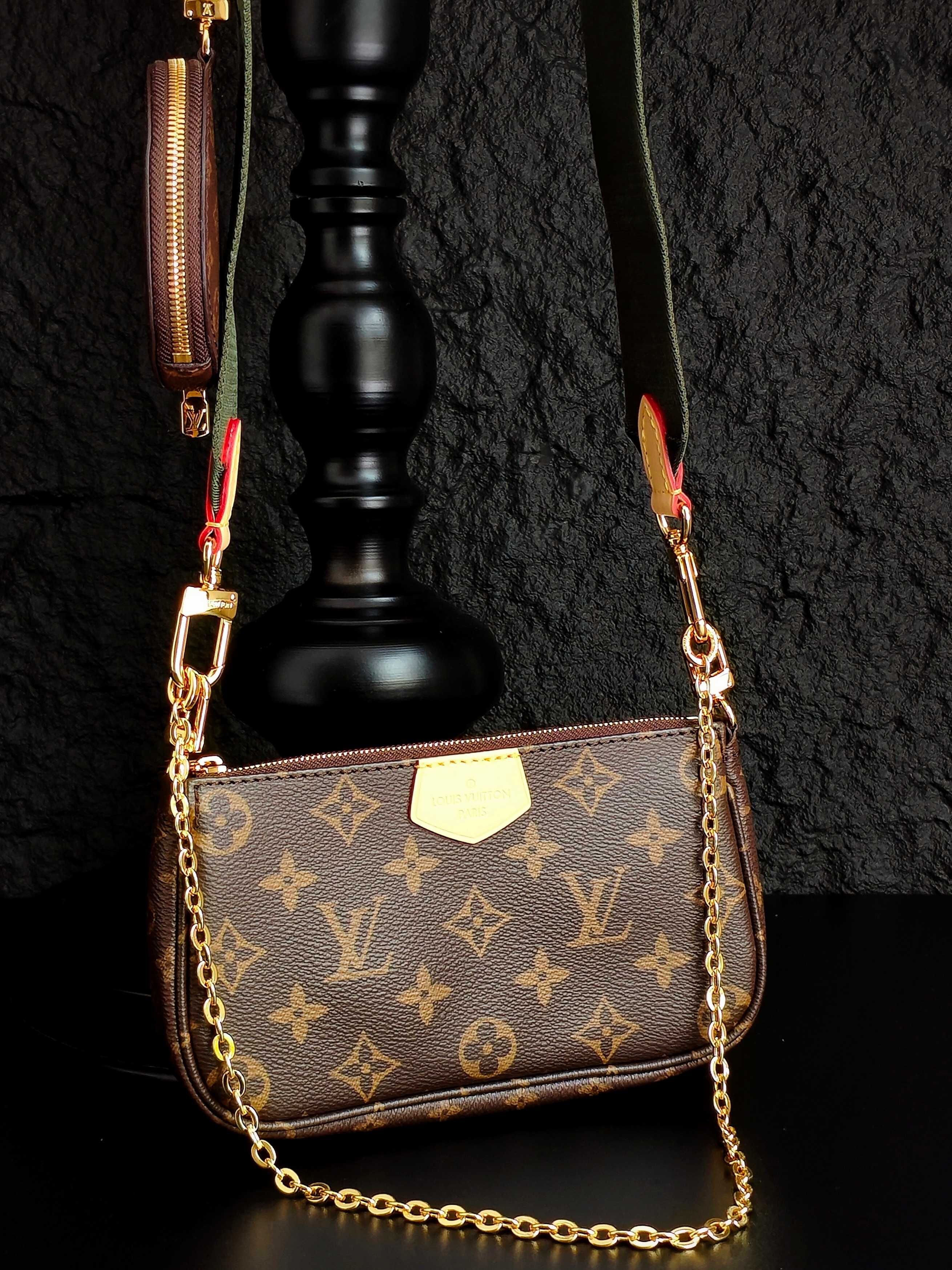 Monogram crossbody bag with gold chain, brown front flap and side zipper