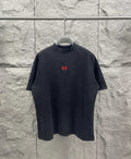Balenciaga short-sleeve T-shirt, dark gray, crew neck, small red chest logo.