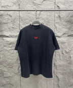 Balenciaga short-sleeve T-shirt, dark gray, crew neck, small red chest logo.