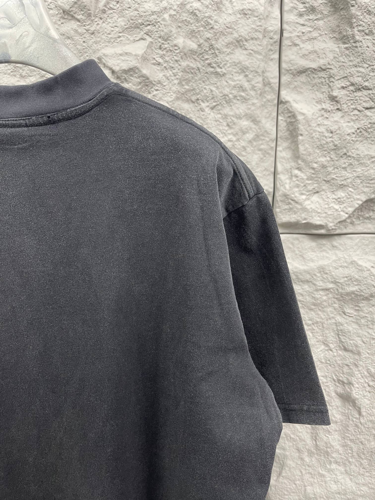 Balenciaga short-sleeve T-shirt sleeve and back, dark gray, no visible logo.