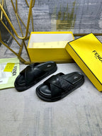 Fendi black leather sandals, crisscross strap design, chunky platform base