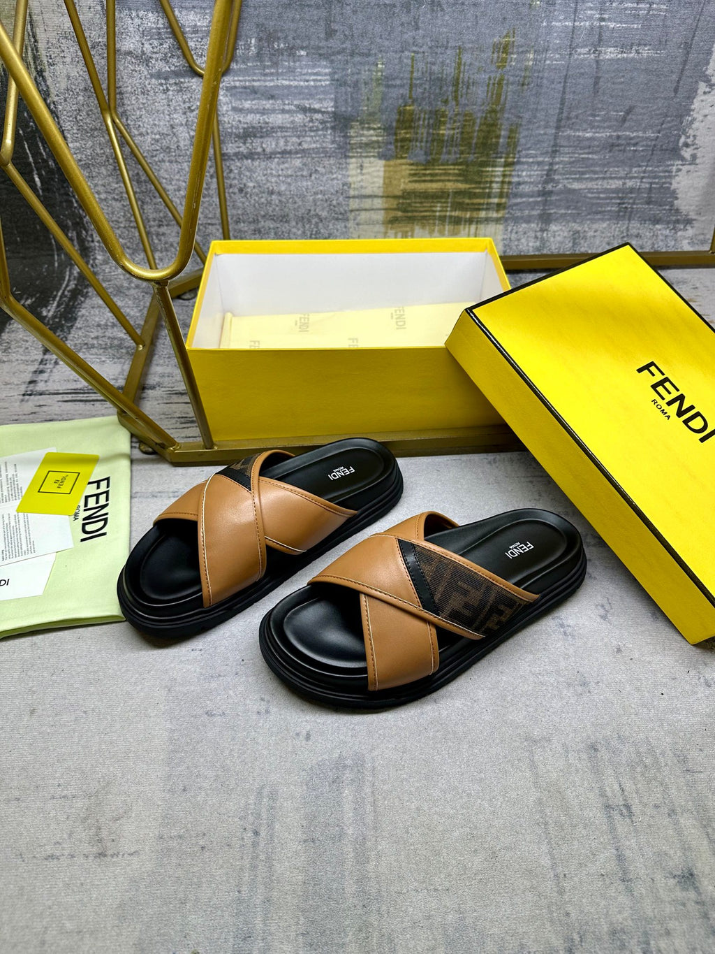 Fendi slide sandals, tan straps with black sole and Fendi logo detail