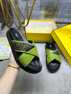 Green and black Fendi sandals with FF-logo strap and cushioned sole