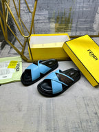 Blue leather slide sandals with black soles and X straps, FENDI