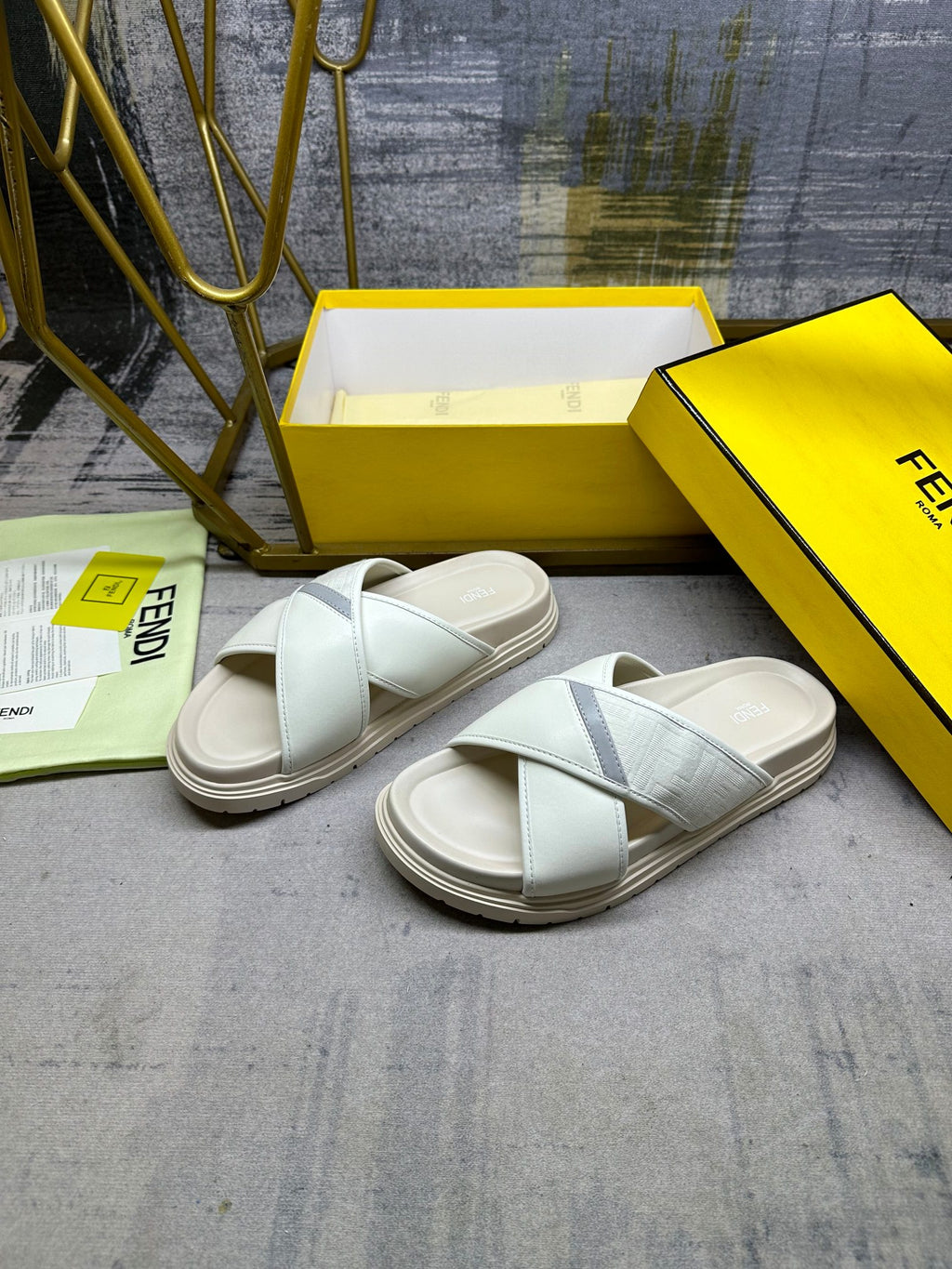 Fendi white sandals with cross over straps and low rubber sole