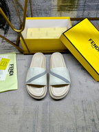 Fendi slide sandals, pair with light blue strap and white cushioned footbed