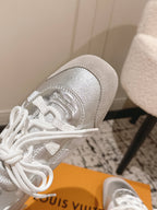 Louis Vuitton metallic silver sneaker toe and lace eyelets, white laces