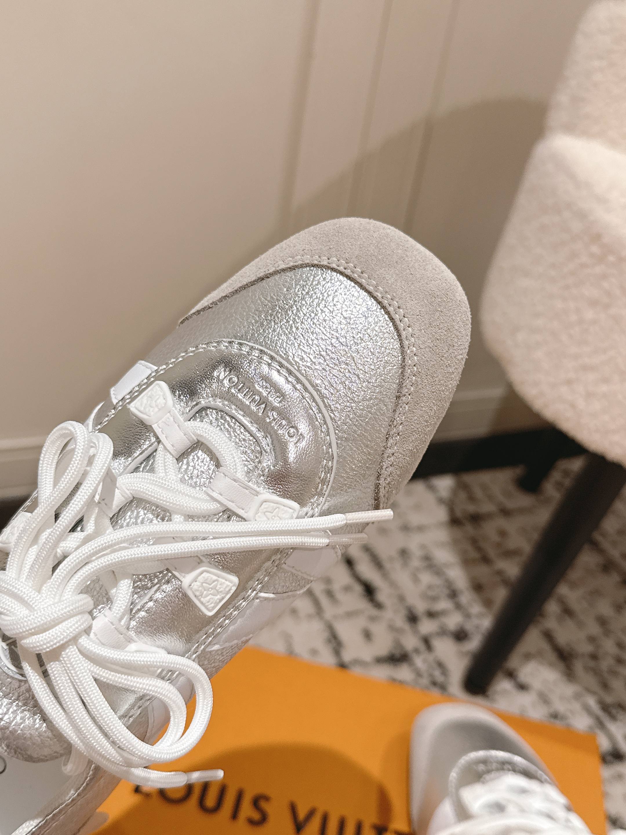 Louis Vuitton metallic silver sneaker toe and lace eyelets, white laces
