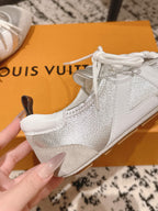 Louis Vuitton metallic silver sneakers with white laces and textured panel detail