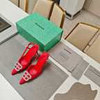 Red strappy high-heel sandals with crystal toe buckle detail
