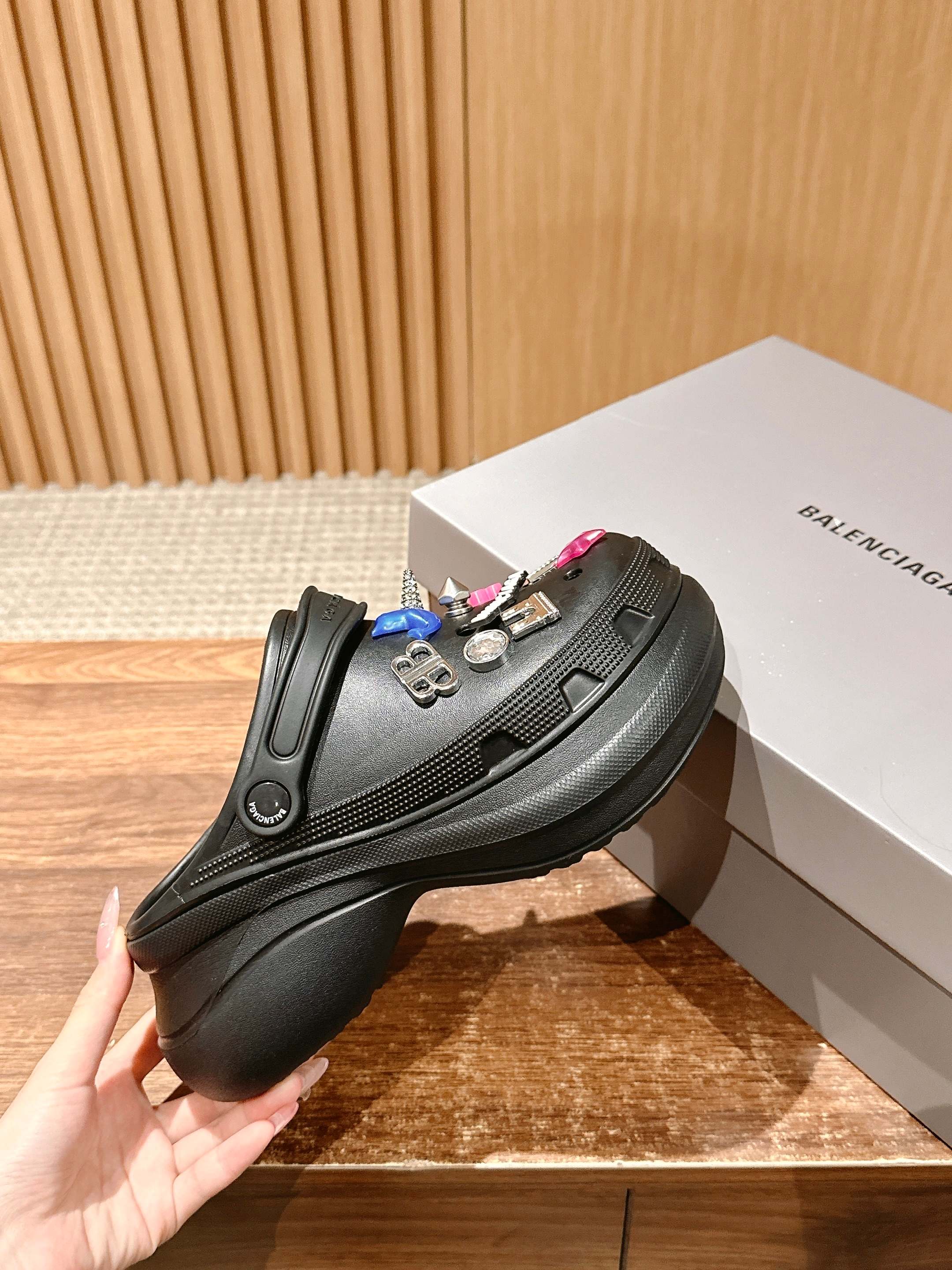 Balenciaga black clog sandals with layered thick sole and charm-studded strap