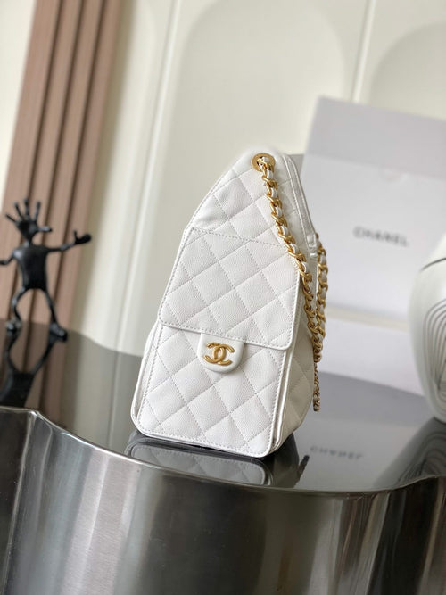 White quilted leather Chanel mini bag with gold chain strap and front flap clasp
