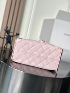 Pink quilted leather Chanel flap bag with gold-tone chain, rectangular shape