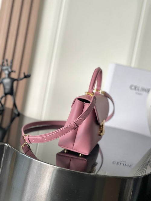 Pink leather Celine handbag with shoulder strap and gold hardware