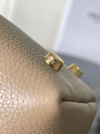 Celine gold-tone ring detail on beige leather strap with buckle