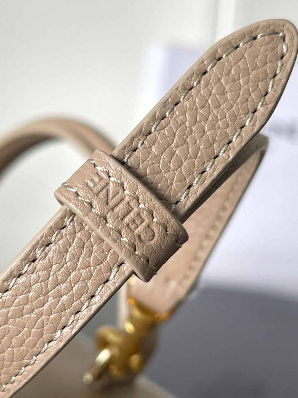 Celine beige leather shoulder strap with logo-embossed keeper