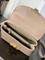 Celine beige small bag interior view with double zip compartments