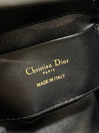 Black leather Dior logo stamp reading "Christian Dior" and "MADE IN ITALY"
