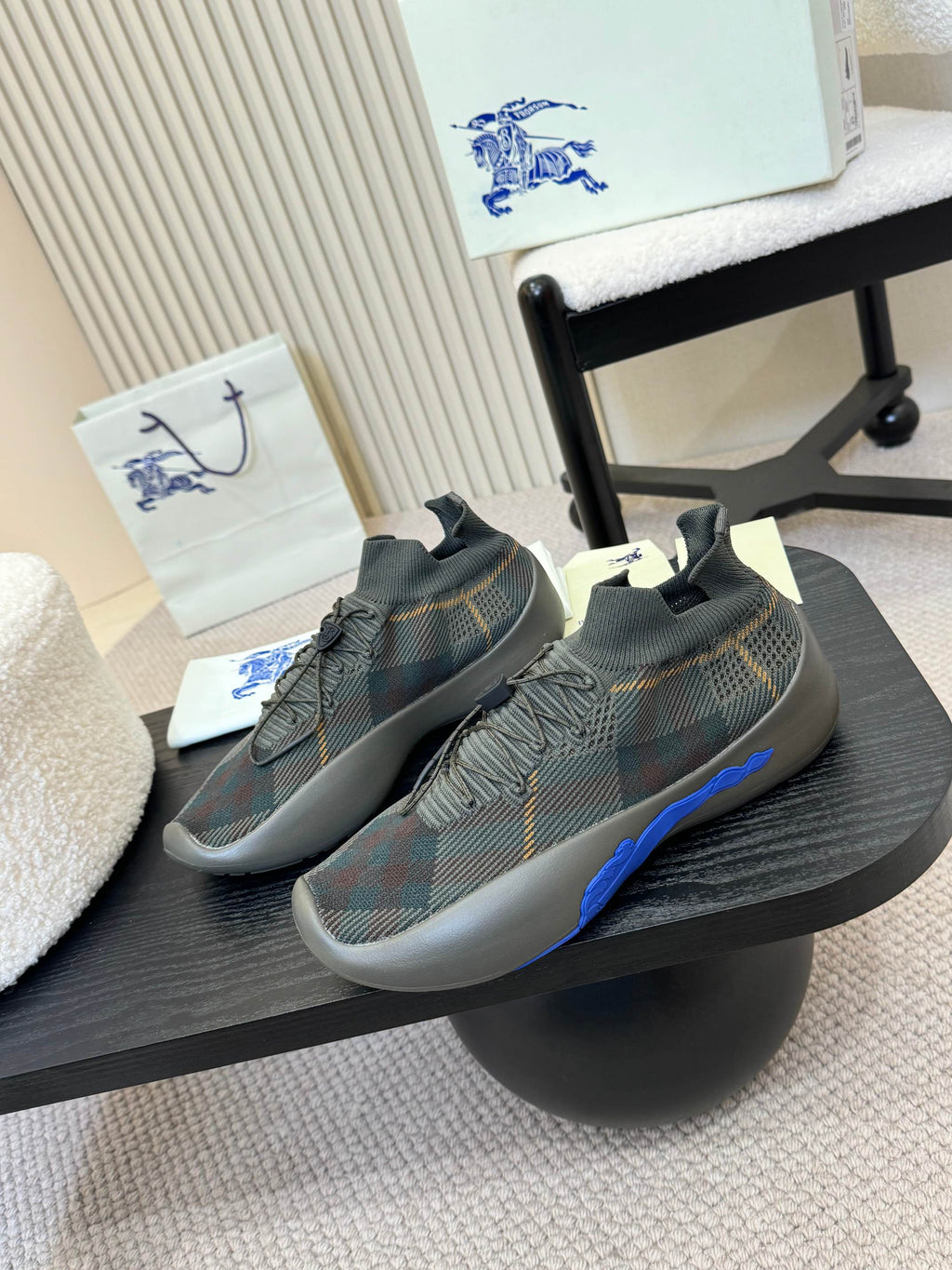 Burberry knit sneakers with blue side stripe and patterned upper, lace-up