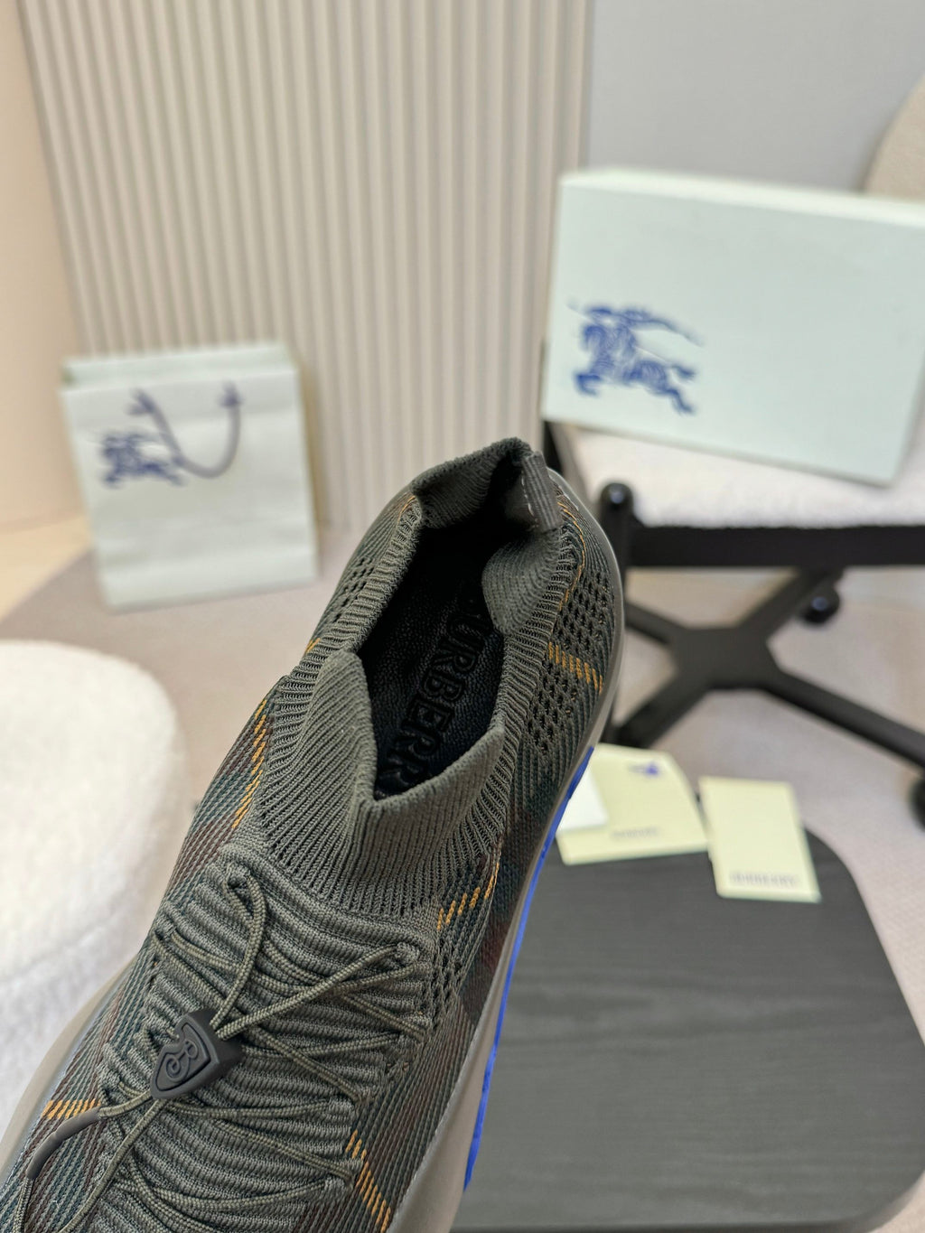 Burberry knit sneaker showing heel opening and textured inner lining
