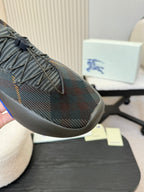Burberry knit sneaker toe with lace-up detail and blue sole stripe