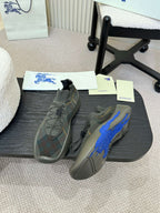 Burberry lace-up knit sneakers with blue accents on outsole and upper