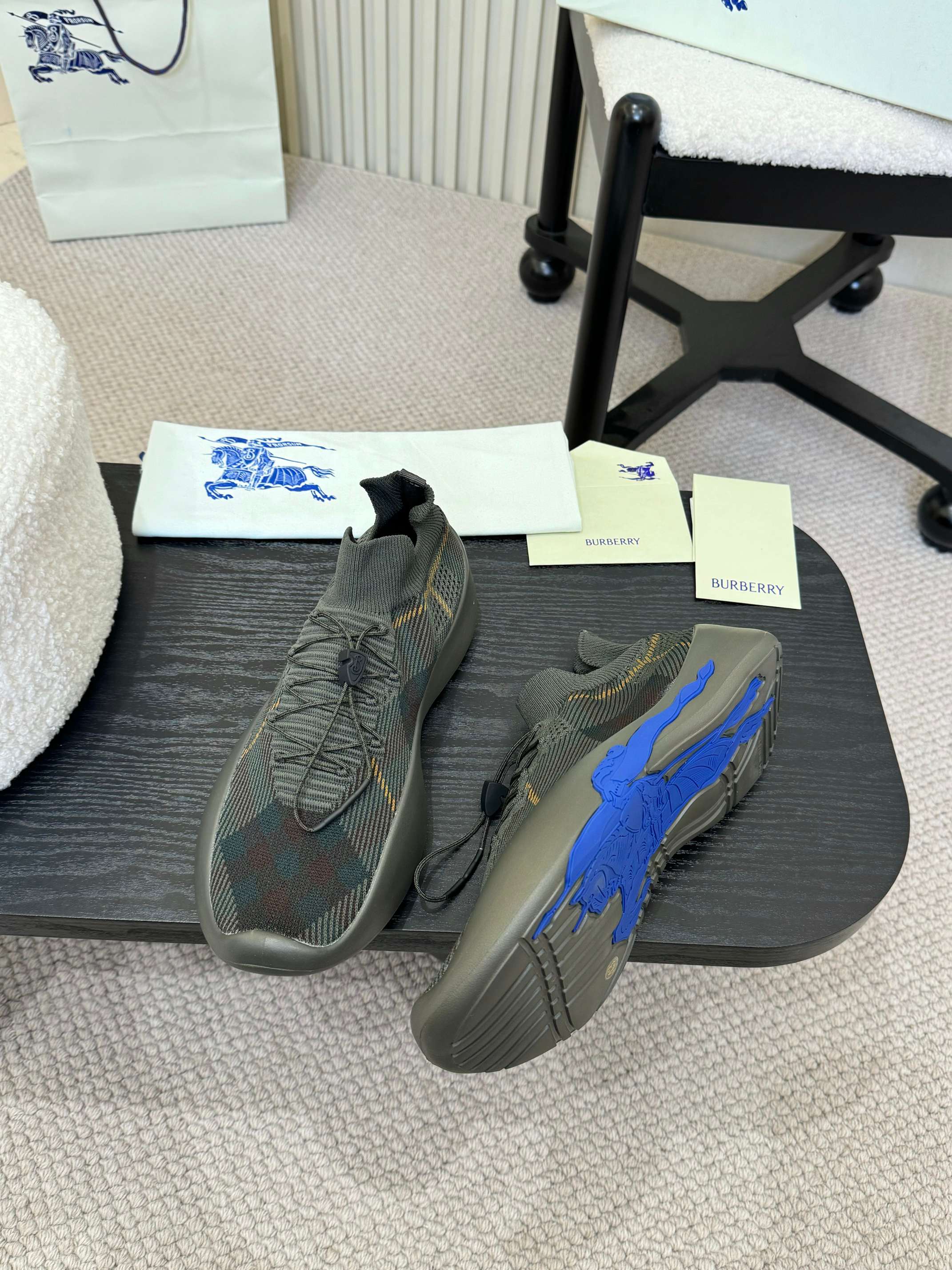 Burberry lace-up knit sneakers with blue accents on outsole and upper