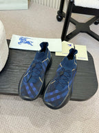 Burberry blue knit slip-on sneakers with plaid pattern and yellow stitch detail