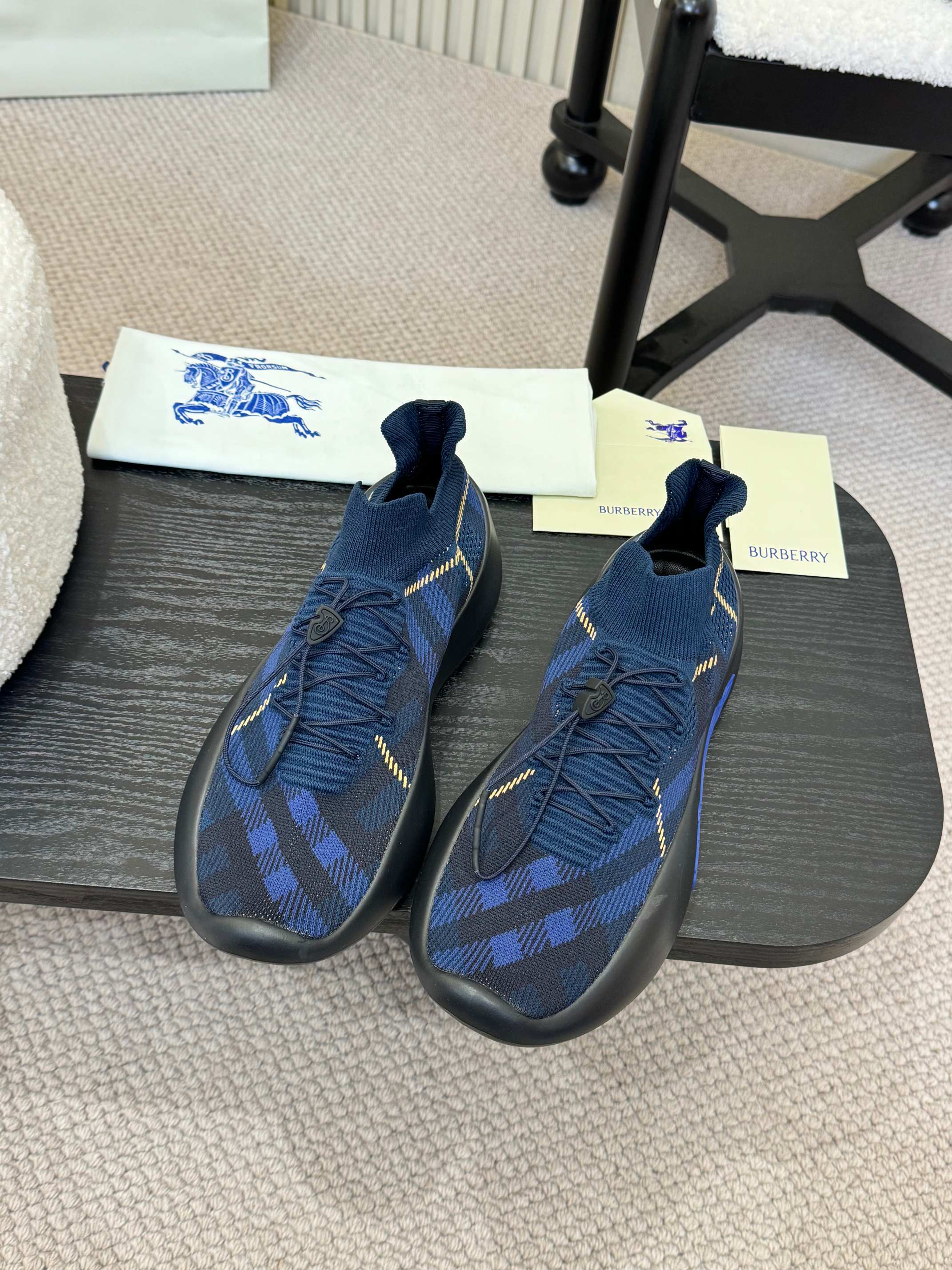 Burberry blue knit slip-on sneakers with plaid pattern and yellow stitch detail