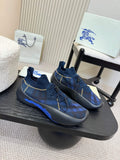 Burberry blue knit slip-on sneakers, plaid pattern, yellow stitching, blue sole