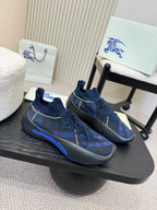 Burberry blue knit slip-on sneakers, plaid pattern, yellow stitching, blue sole