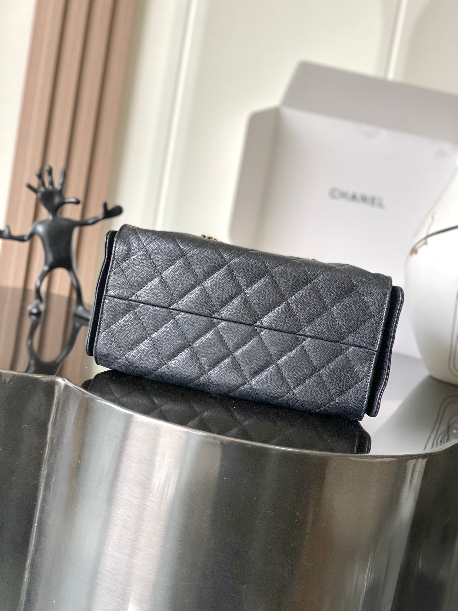 Chanel quilted leather clutch bag, dark gray with stitched diamond pattern