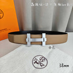 Belt with tan leather strap and silver square buckle, dual prongs, front view