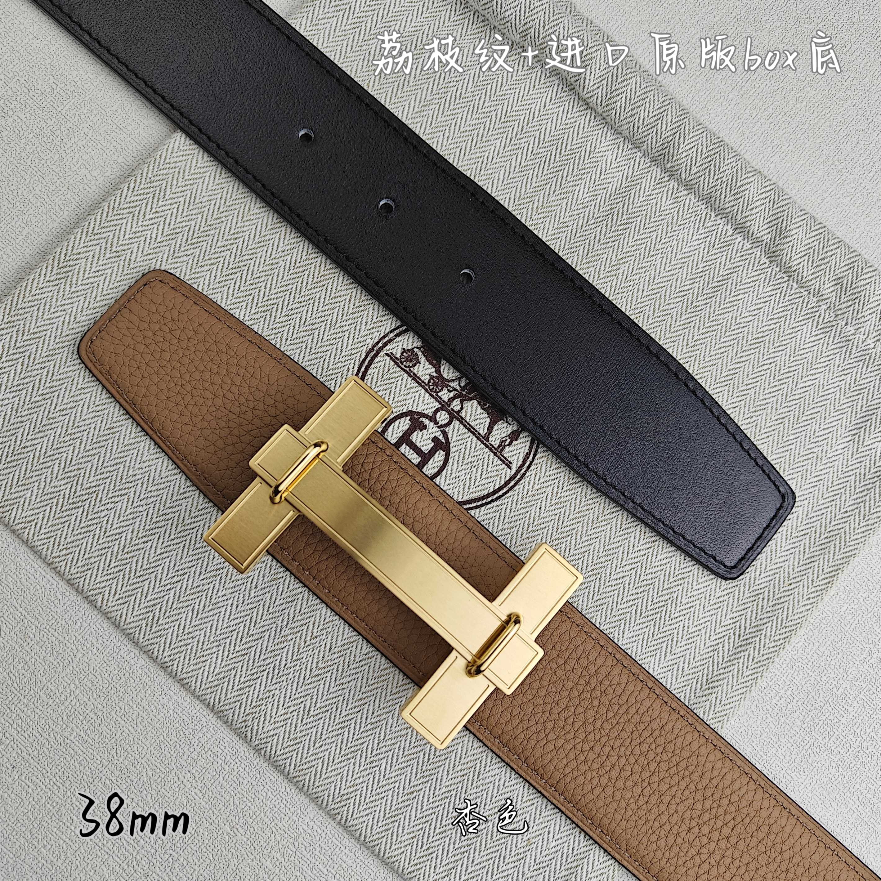 Belt with tan leather strap and black keeper, gold square buckle, top view