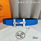 Blue leather Hermes belt with silver rectangular buckle, 38 mm width.
