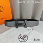 Light gray leather belt with dark-tone rectangular buckle and keeper