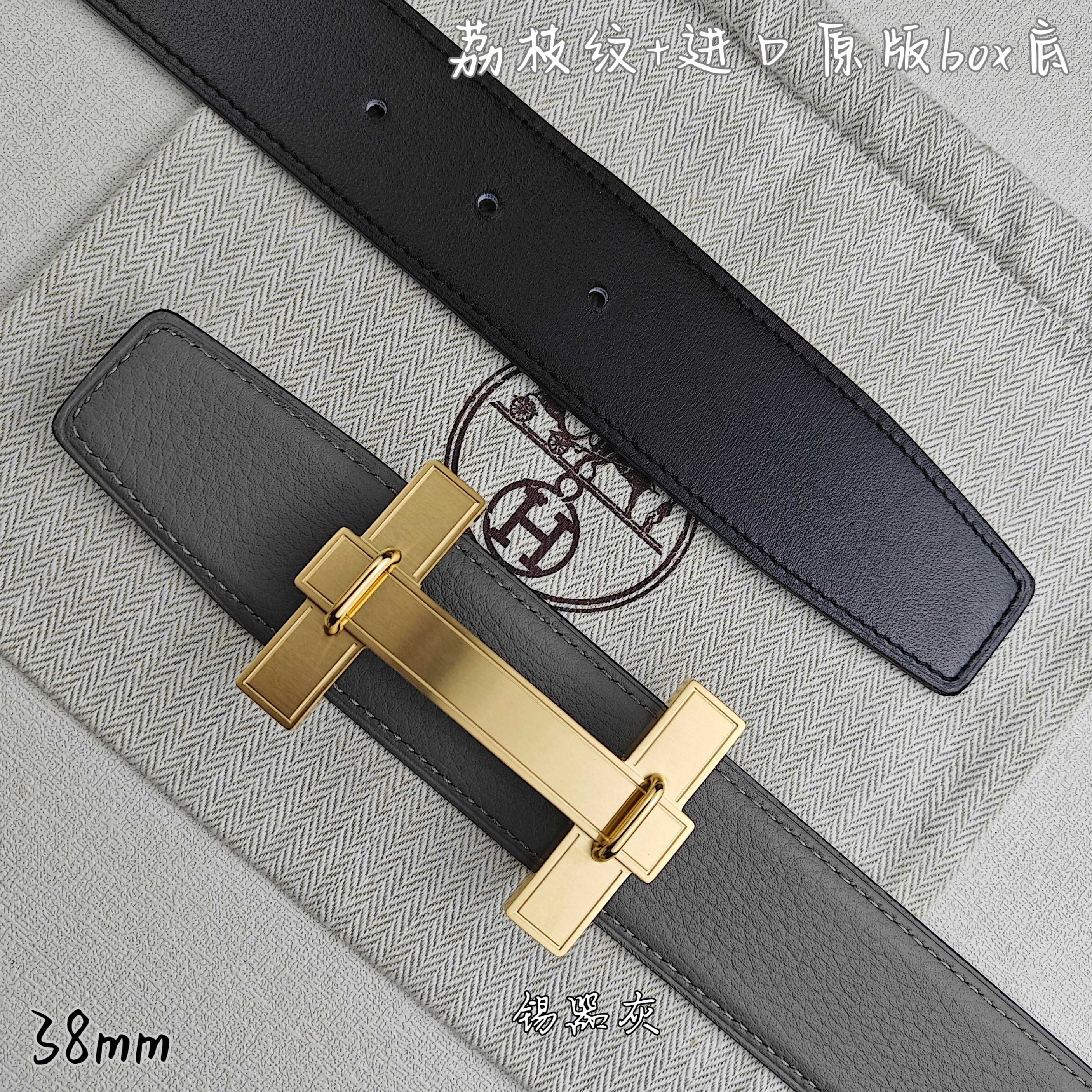 Dark gray leather belt with gold-tone rectangular buckle and keeper loops