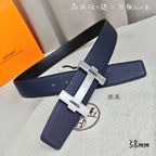Blue leather belt with silver-tone H buckle, angled view.