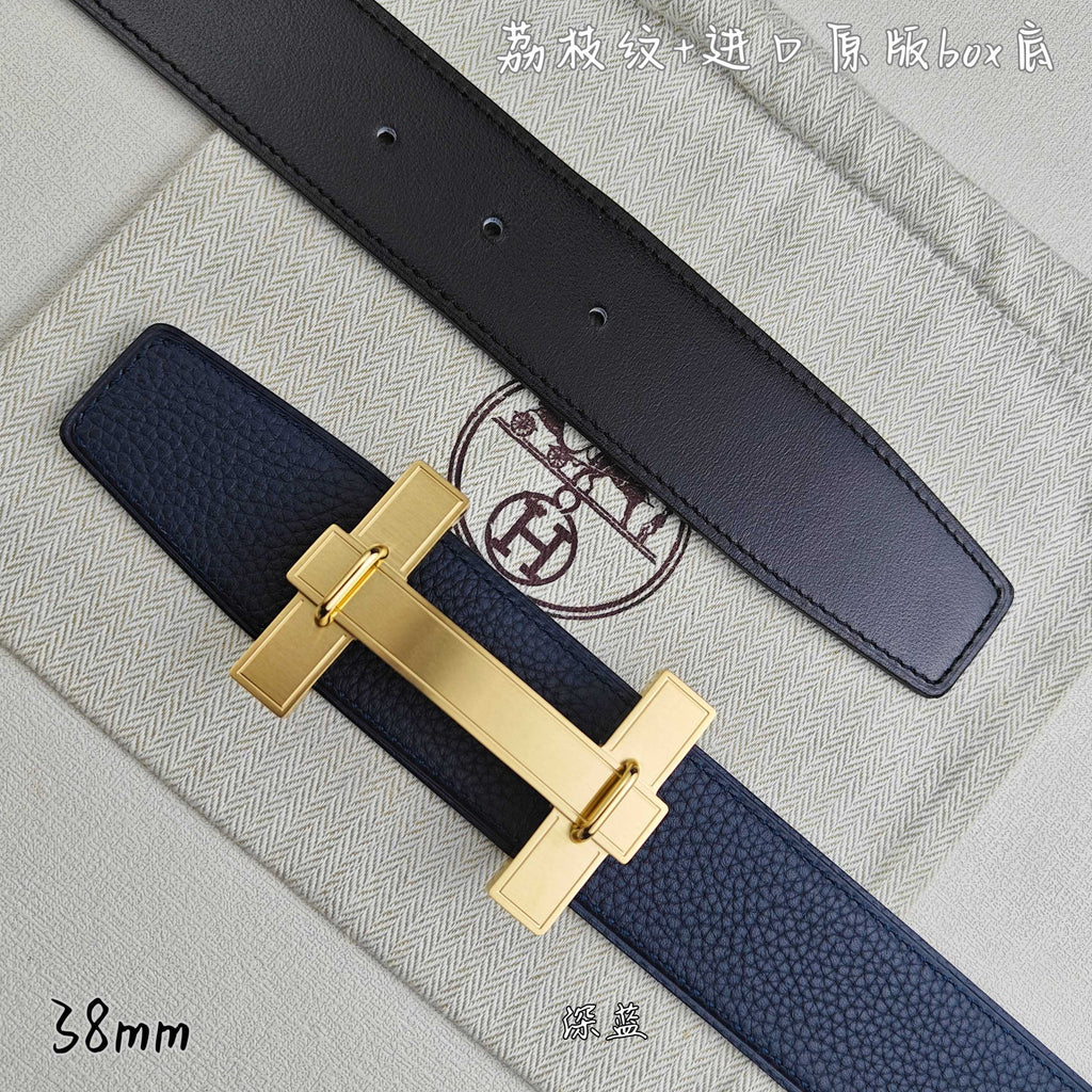 Blue and black leather belts with gold-tone H buckle, side view.