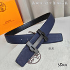 Blue leather belt with dark-tone H buckle and keeper, angled view.