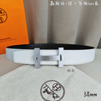 White leather belt with silver-tone rectangular buckle and double-bar frame.