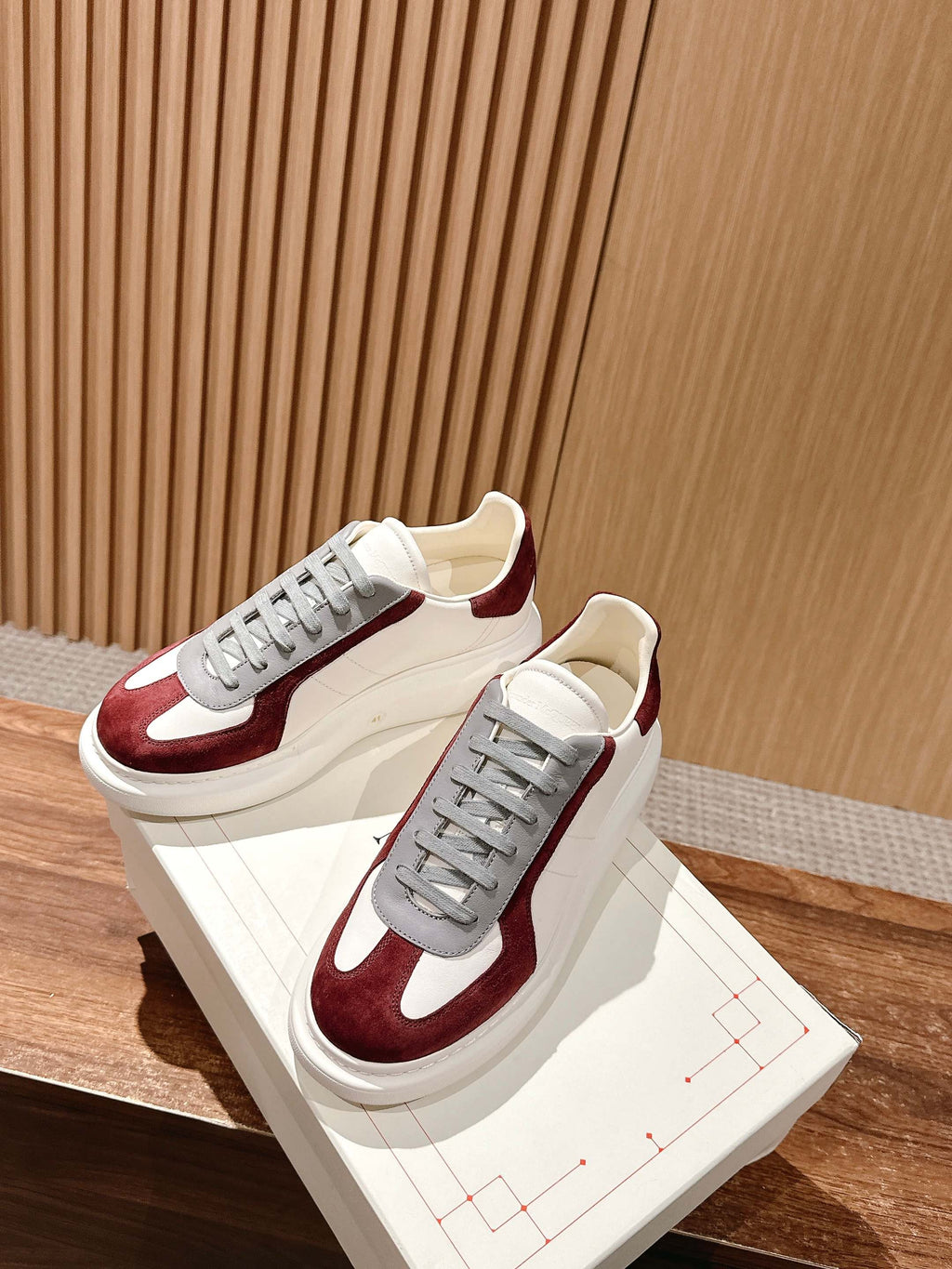 Alexander McQueen sneakers, white leather upper with burgundy and grey lace detail