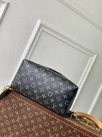 Louis Vuitton monogram canvas shoulder bag with top zipper and gold-tone hardware